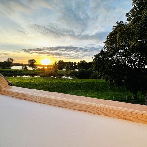 Sonnenuntergang aus dem Dachfenster